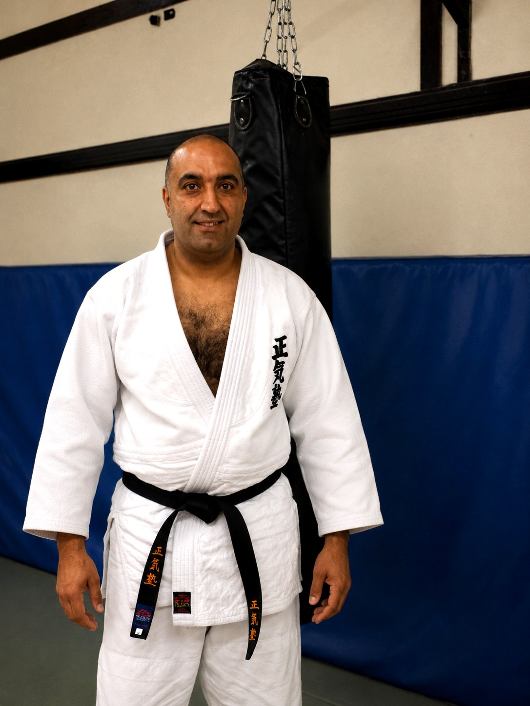 Robbie Mair in his gi — three black belts in jujitsu